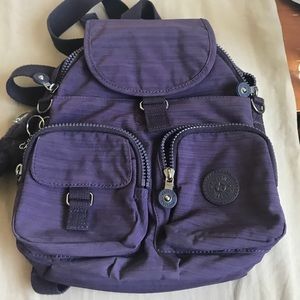 Kipling firefly n dazzling purple